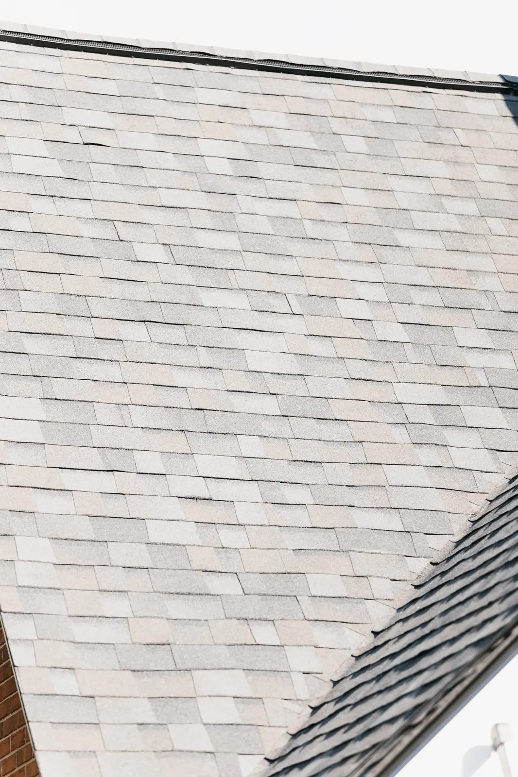Tile roof installation on an Atlanta luxury home for elegant appearance and weather resistance