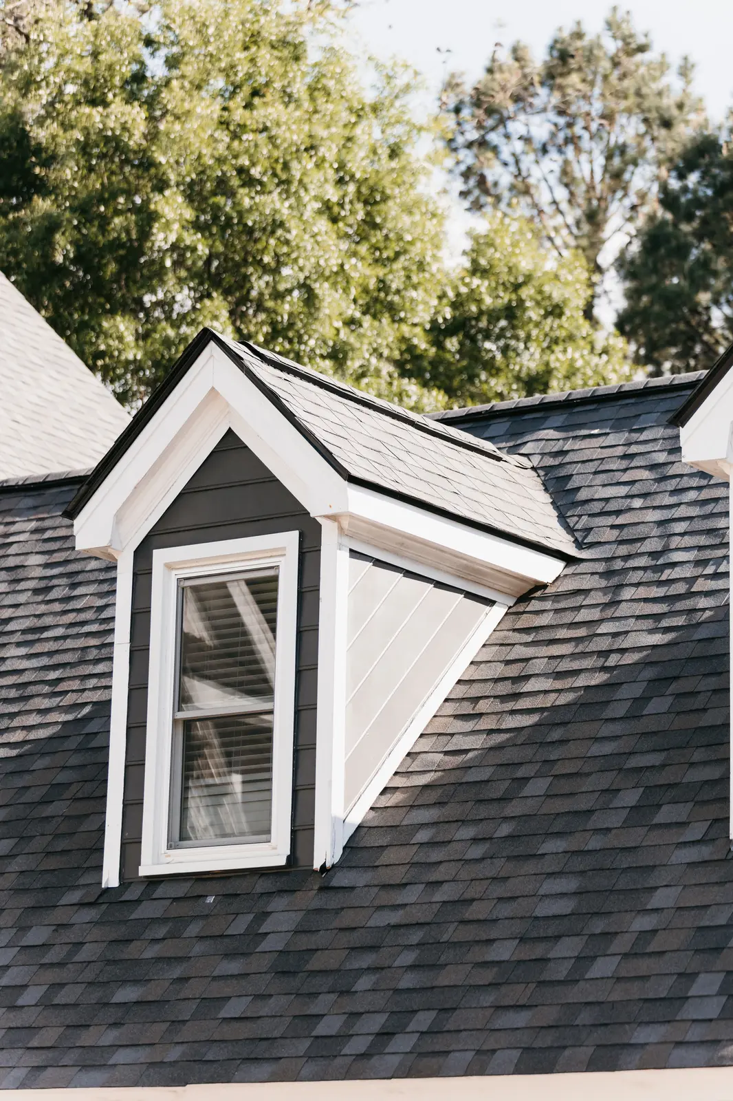 Completed residential roof replacement in Atlanta, GA on a single-family home with architectural asphalt shingles