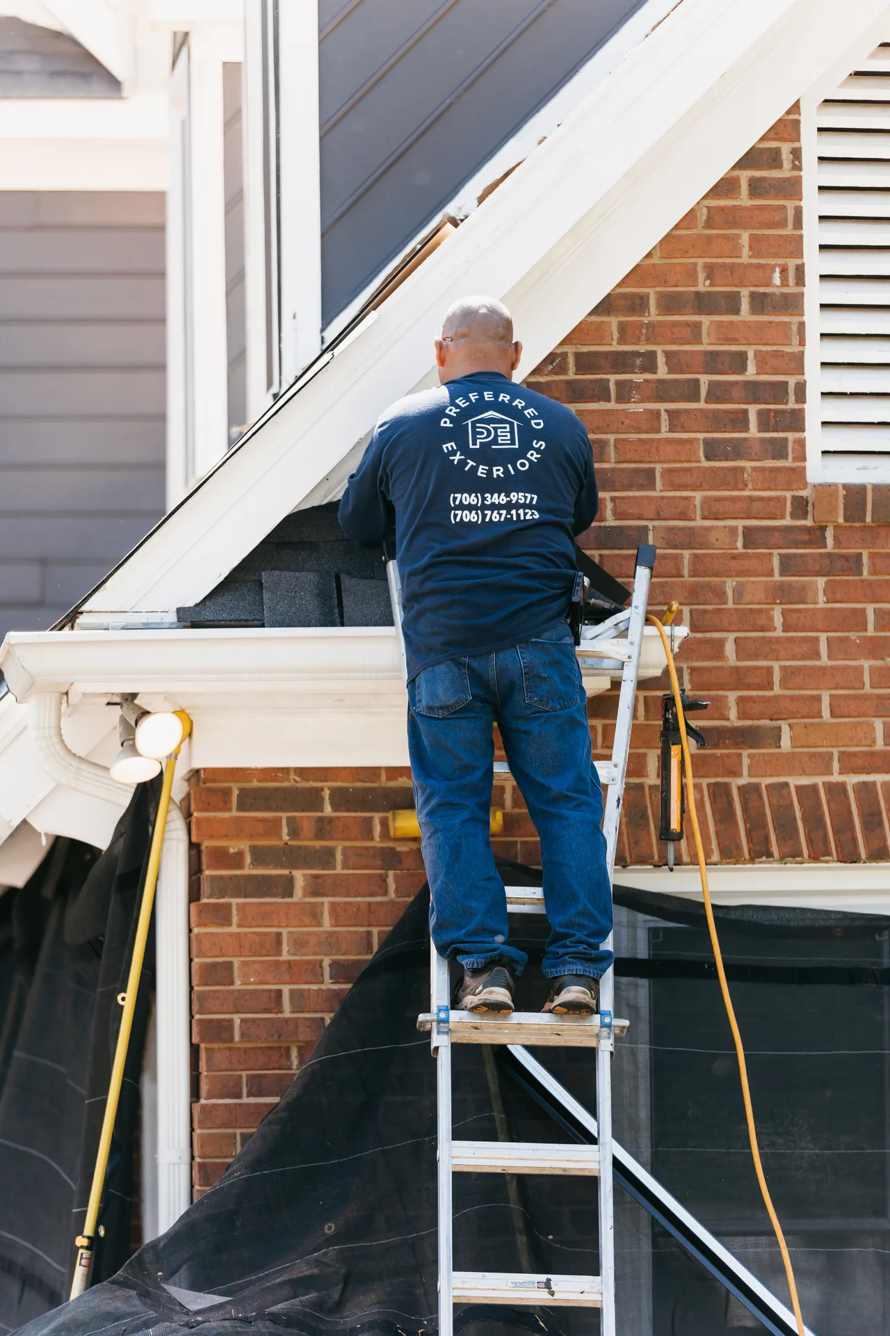 Gutter replacement project in progress on an Atlanta, GA home near AMC Parkway Pointe