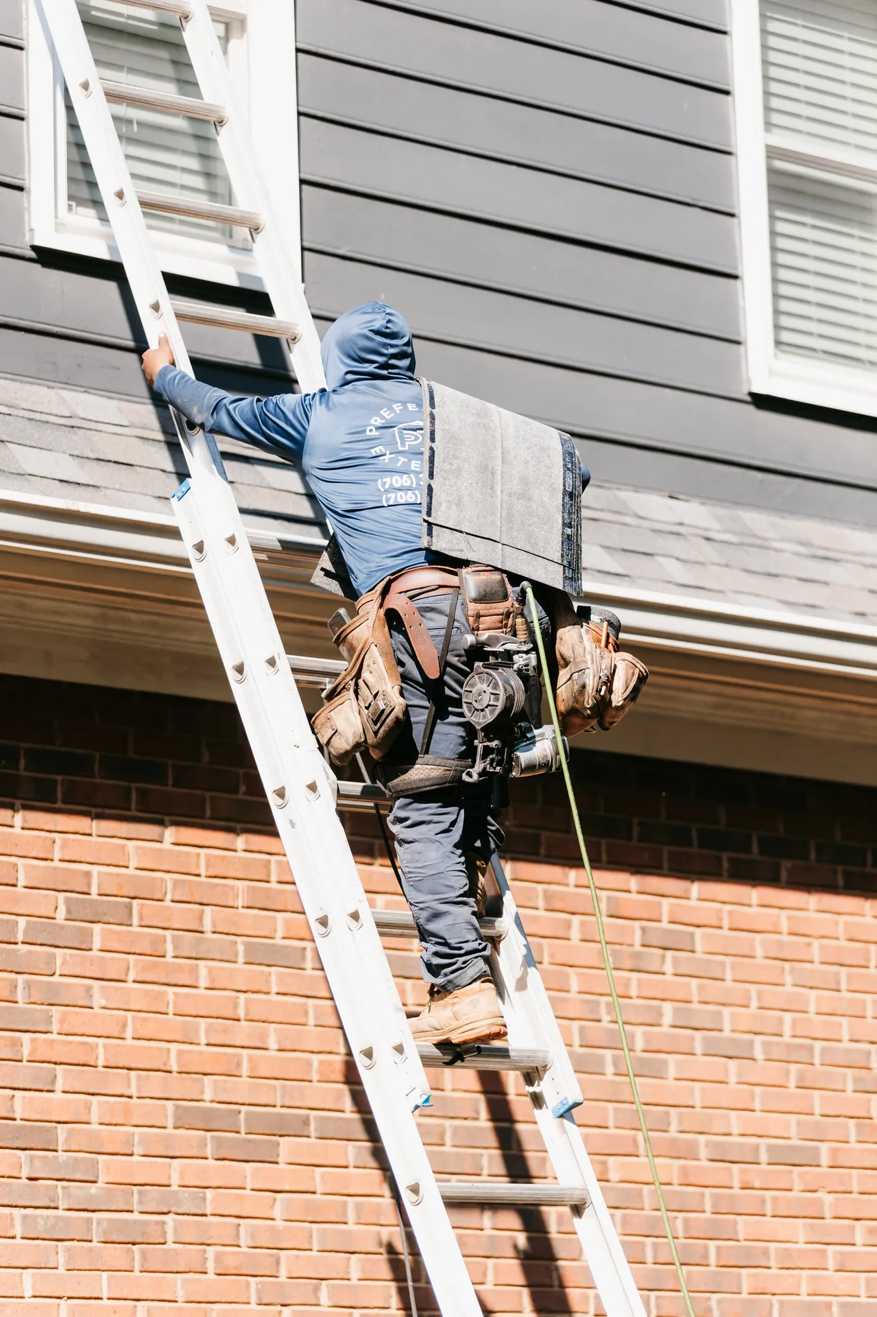 Gutter cleaning and debris removal service near The Battery Atlanta to prevent water damage
