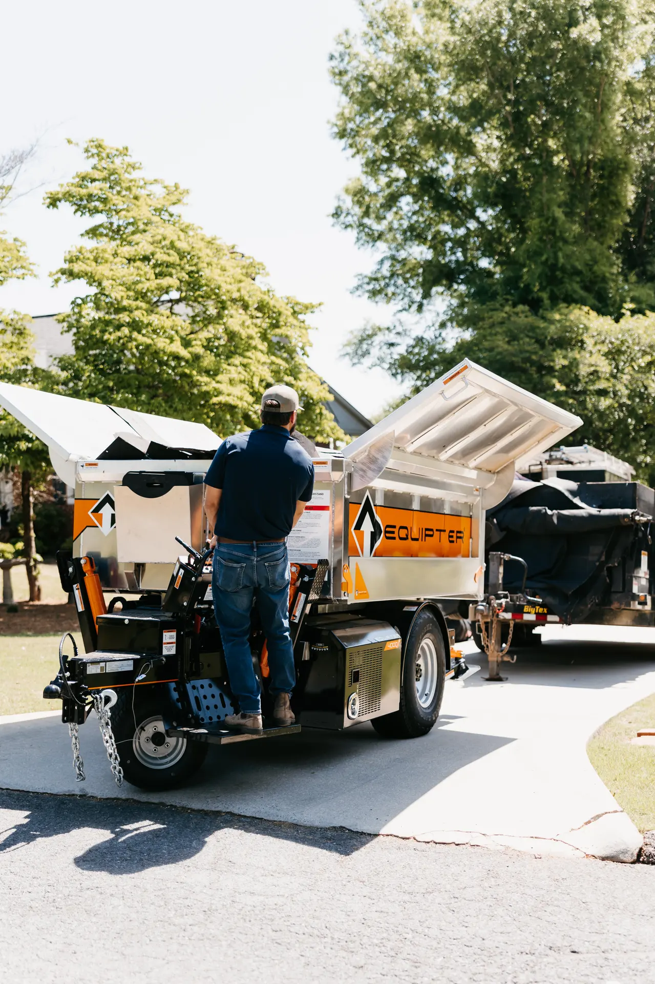 Emergency roof repair crew responding to storm damage on an Atlanta, GA home