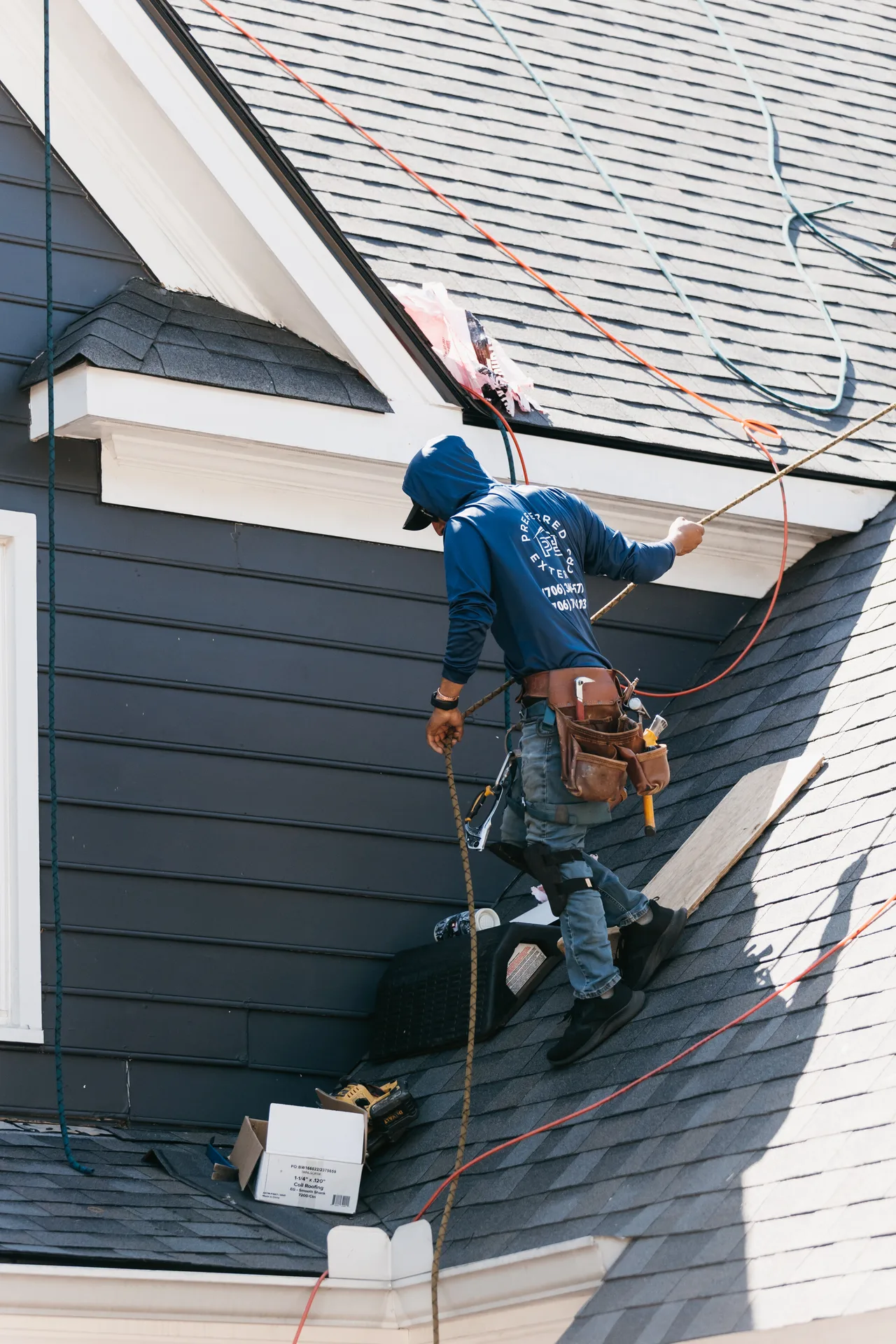 Metro Atlanta roof replacement crew on residential home near Cobb Parkway