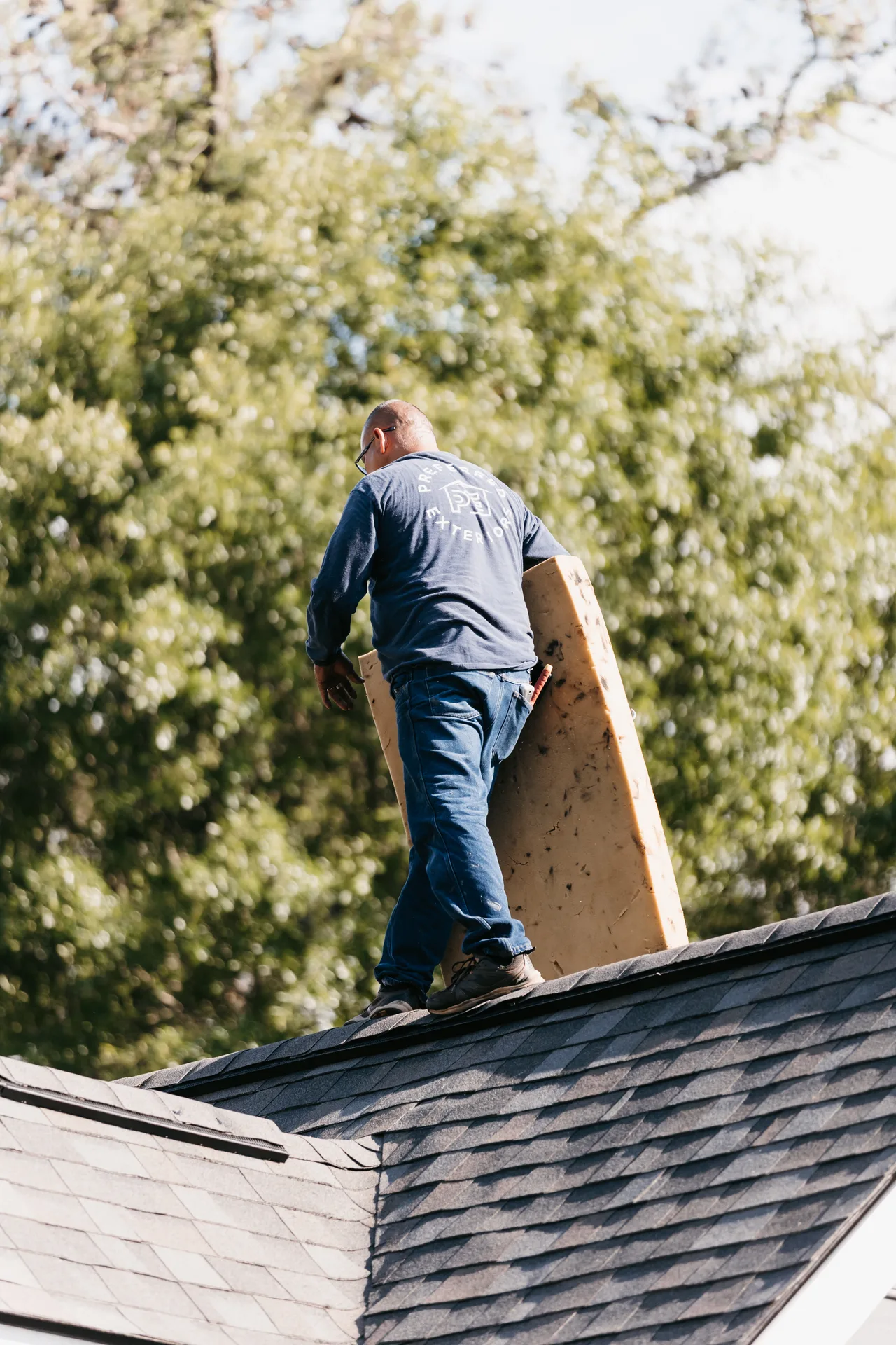 Preferred Roofing & Exteriors roof replacement contractor on an Atlanta jobsite