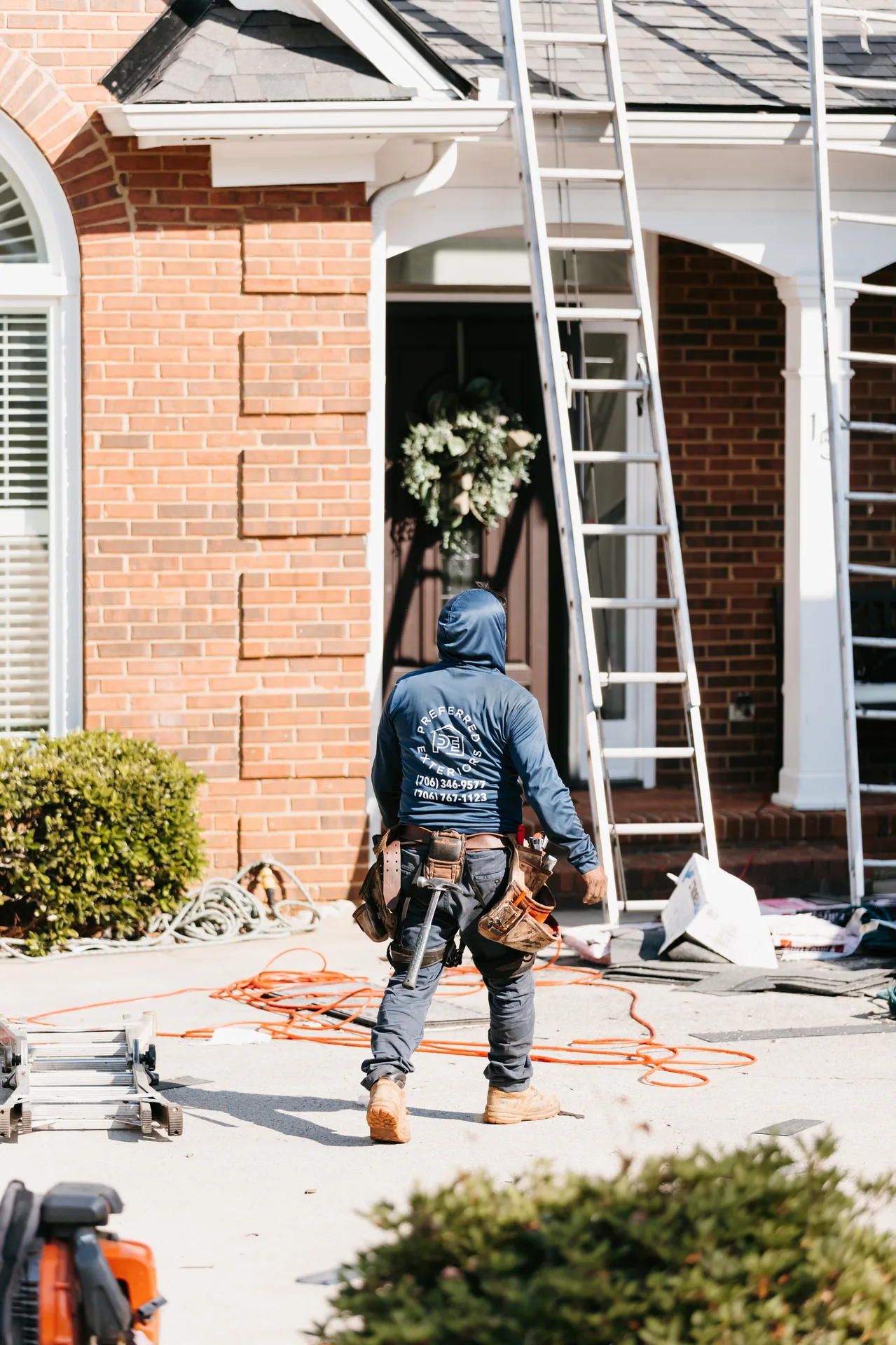 Preferred Roofing & Exteriors roof repair specialist on an Atlanta jobsite