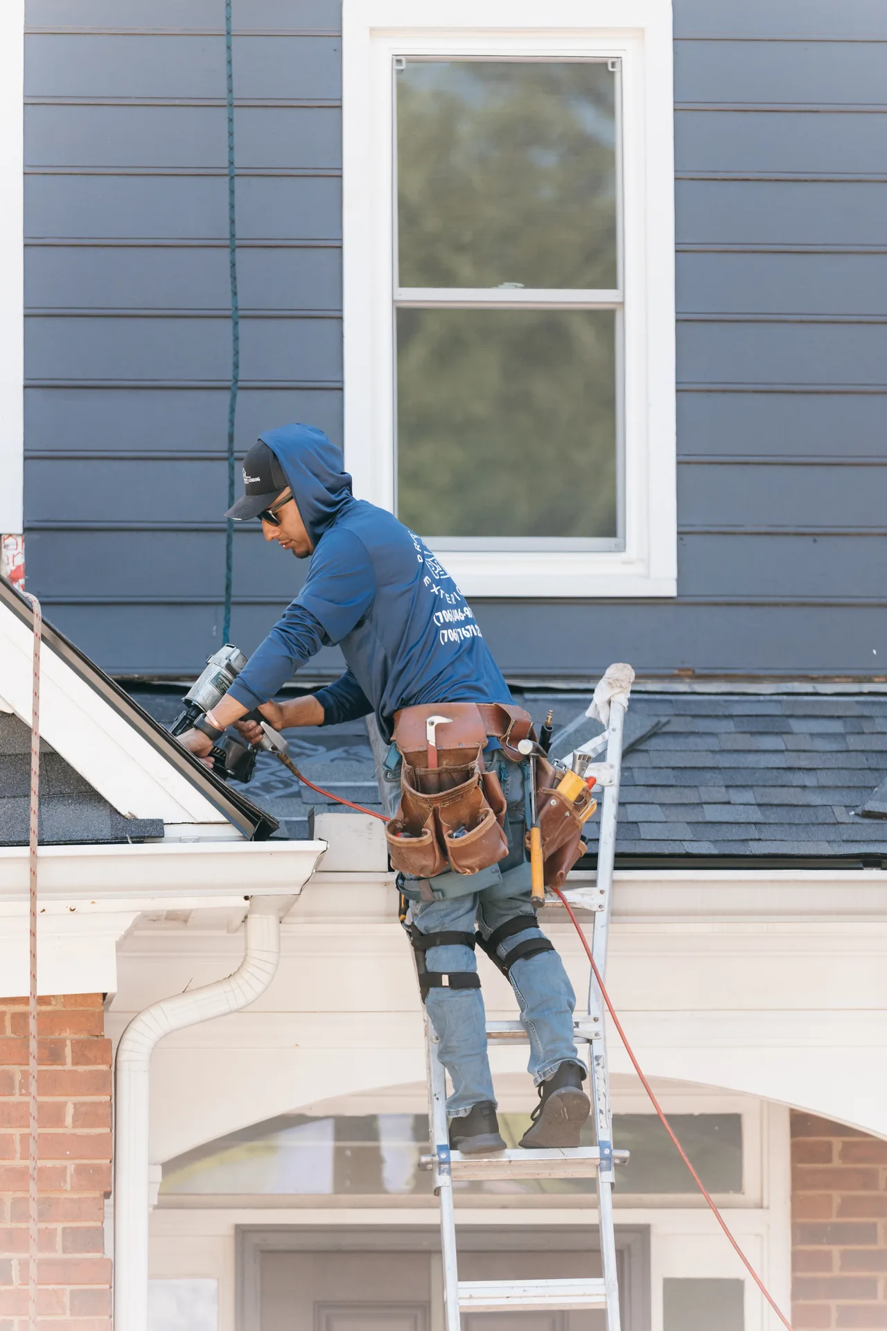 Asphalt shingle roof replacement in progress on an Atlanta home